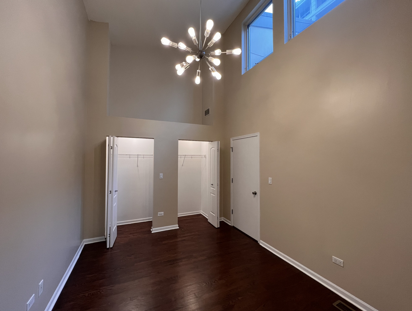 Undisclosed Address Chicago, IL 60610 - Photo 8 of 12 a view of an empty room with wooden floor