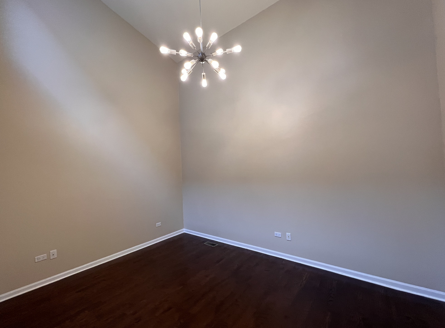 Undisclosed Address Chicago, IL 60610 - Photo 9 of 12 a view of an empty room with wooden floor