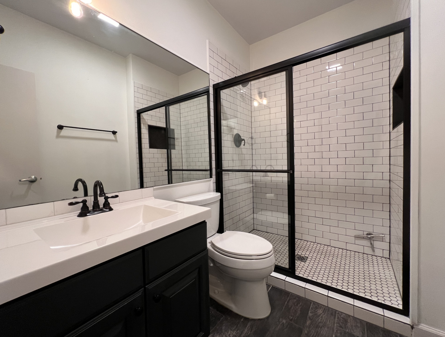 Undisclosed Address Chicago, IL 60610 - Photo 10 of 12 a bathroom with a sink toilet and shower