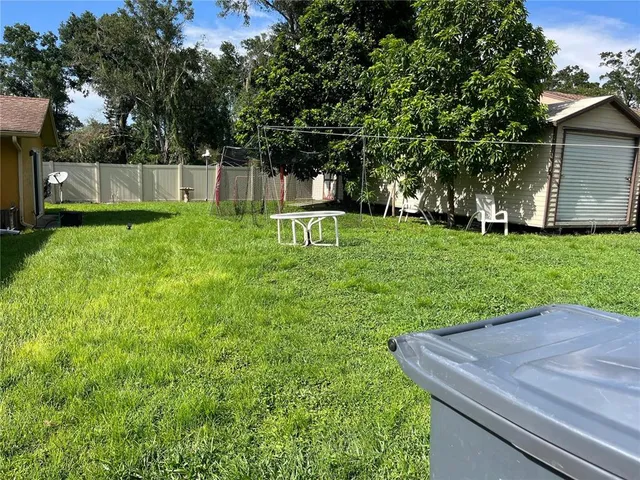 a view of a backyard with a garden