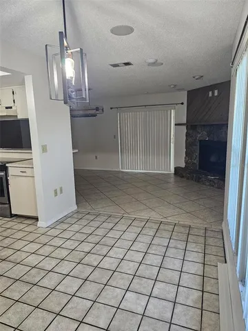 a view of a livingroom with a fireplace