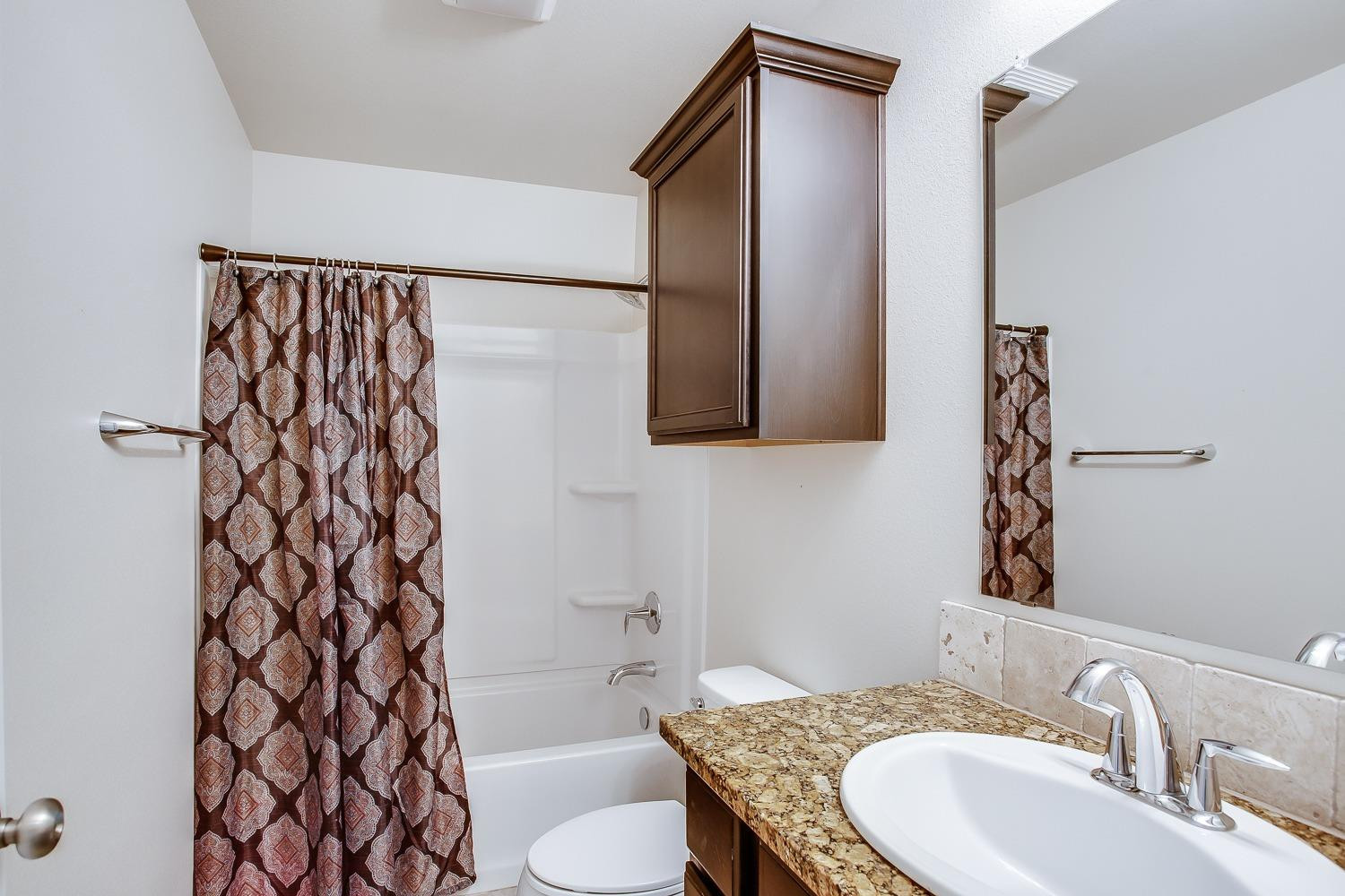 7428 103rd Street Lubbock, TX 79424 - Photo 14 of 18 Guest Bathroom