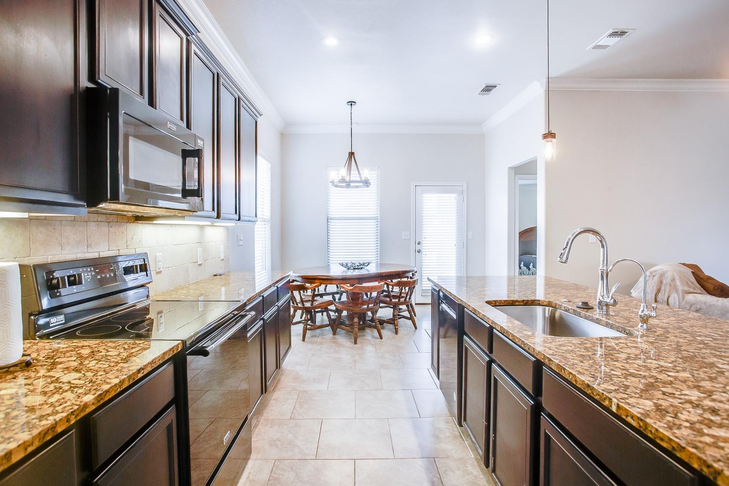 7428 103rd Street Lubbock, TX 79424 - Photo 7 of 18 Soft Modern Tones throughout.