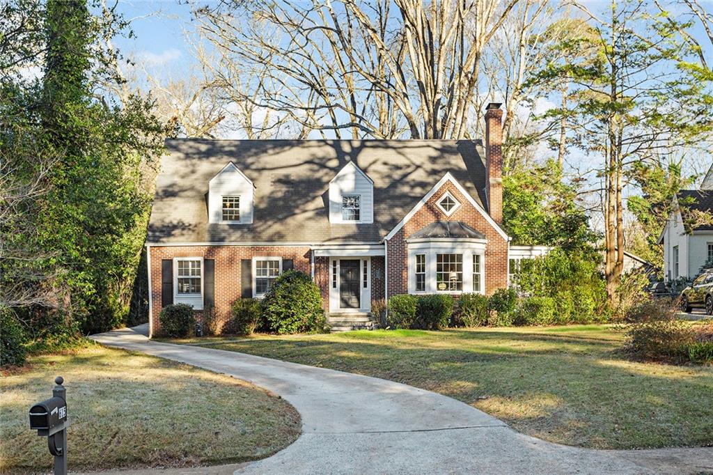 615 Ridgecrest Road Northeast Atlanta, GA 30307 - Photo 1 of 1 front view of house with a yard