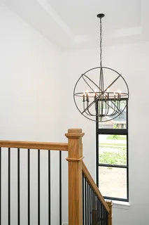 a view of a balcony with a chandelier