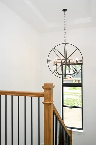 a view of a balcony with a chandelier