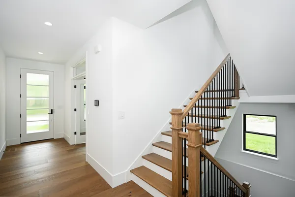 a view of entryway with wooden floor