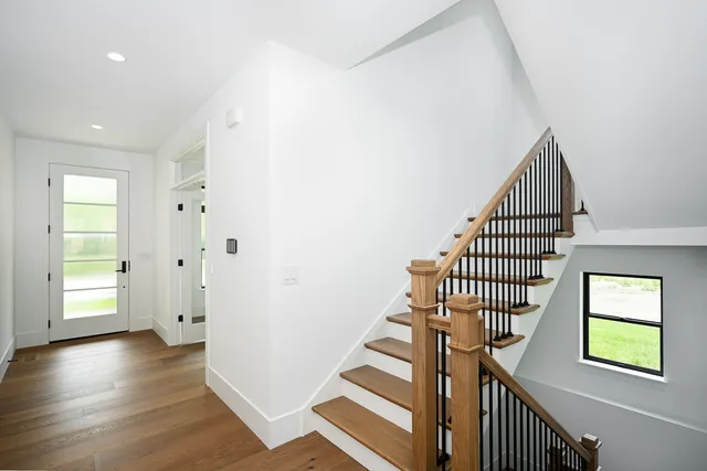 a view of entryway with wooden floor