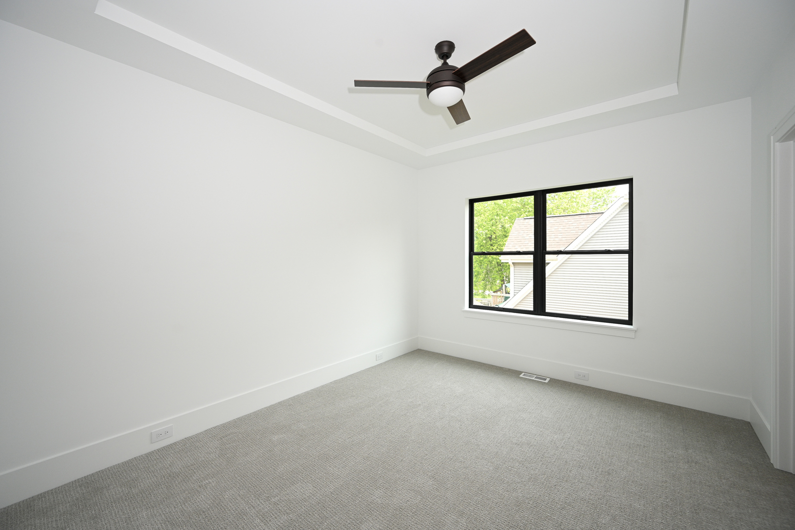 64 Miller Road Lake Zurich, IL 60047 - Photo 26 of 28 an empty room with a window and a ceiling fan