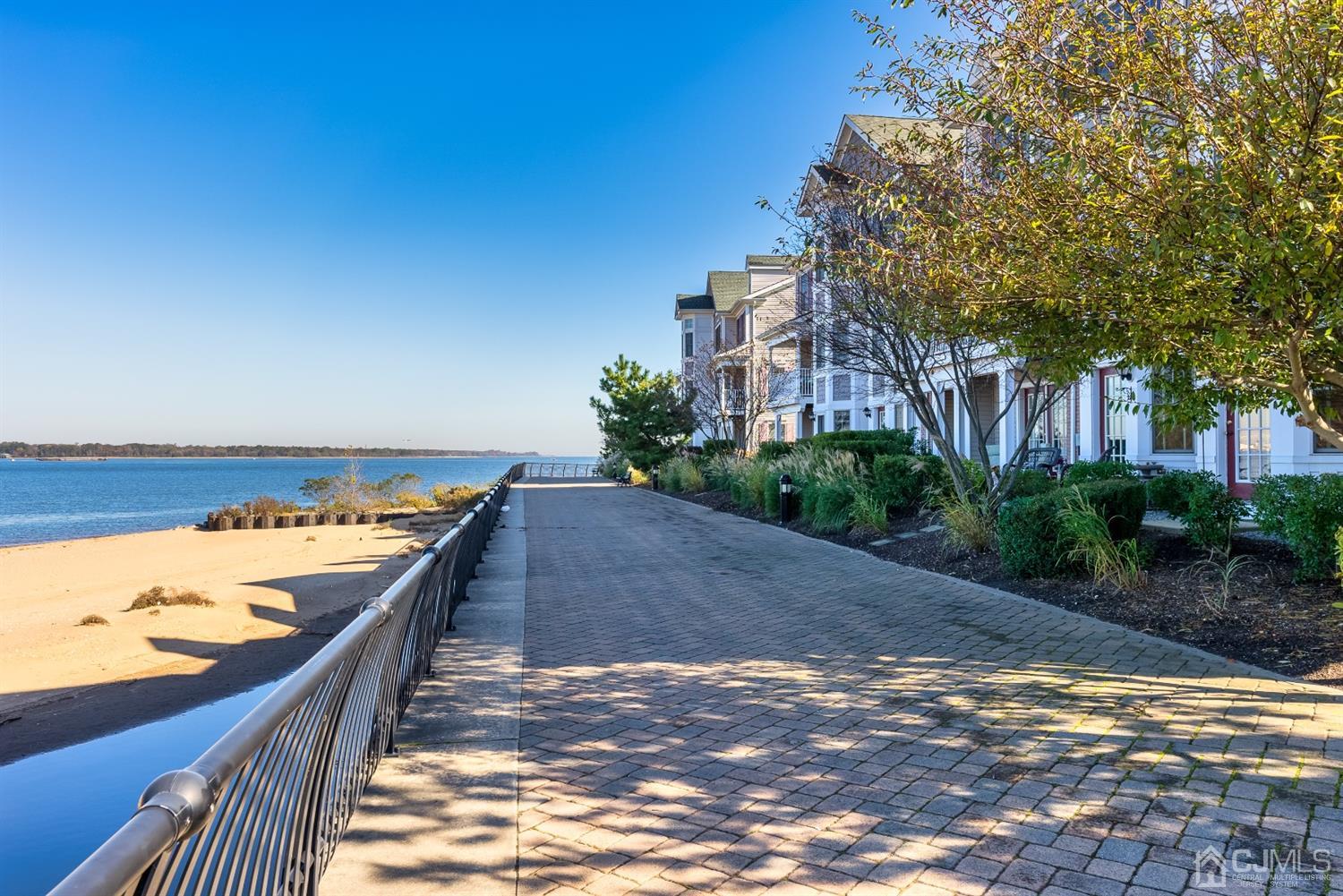 48 Raritan Reach Road South Amboy, NJ 08879 - Photo 22 of 23 a view of an ocean with a house in the background
