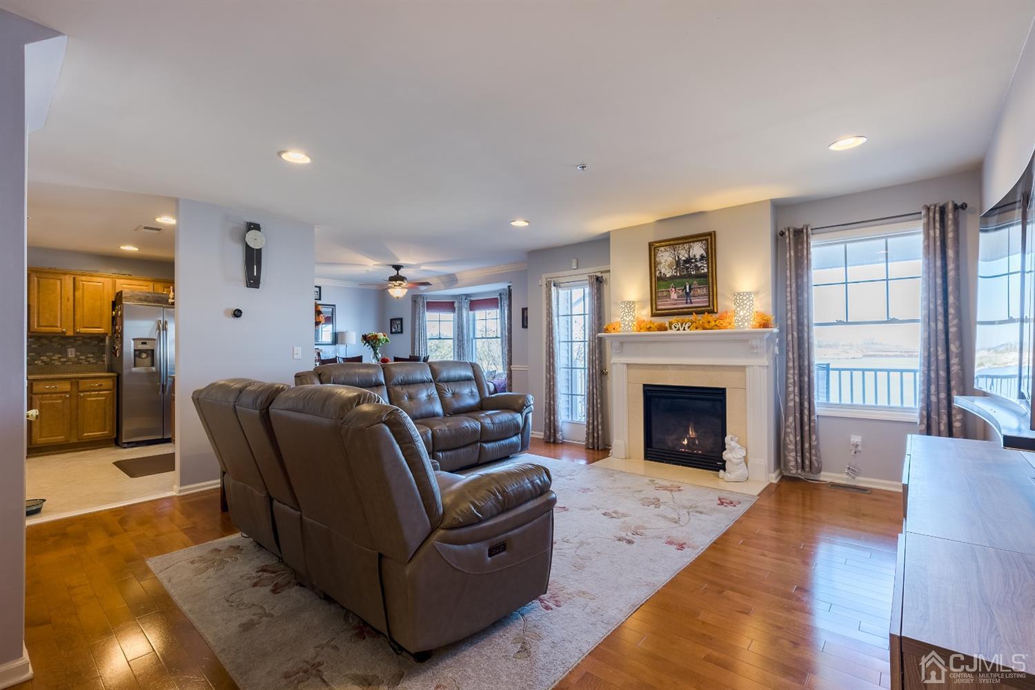 48 Raritan Reach Road South Amboy, NJ 08879 - Photo 5 of 23 a living room with furniture and a fireplace