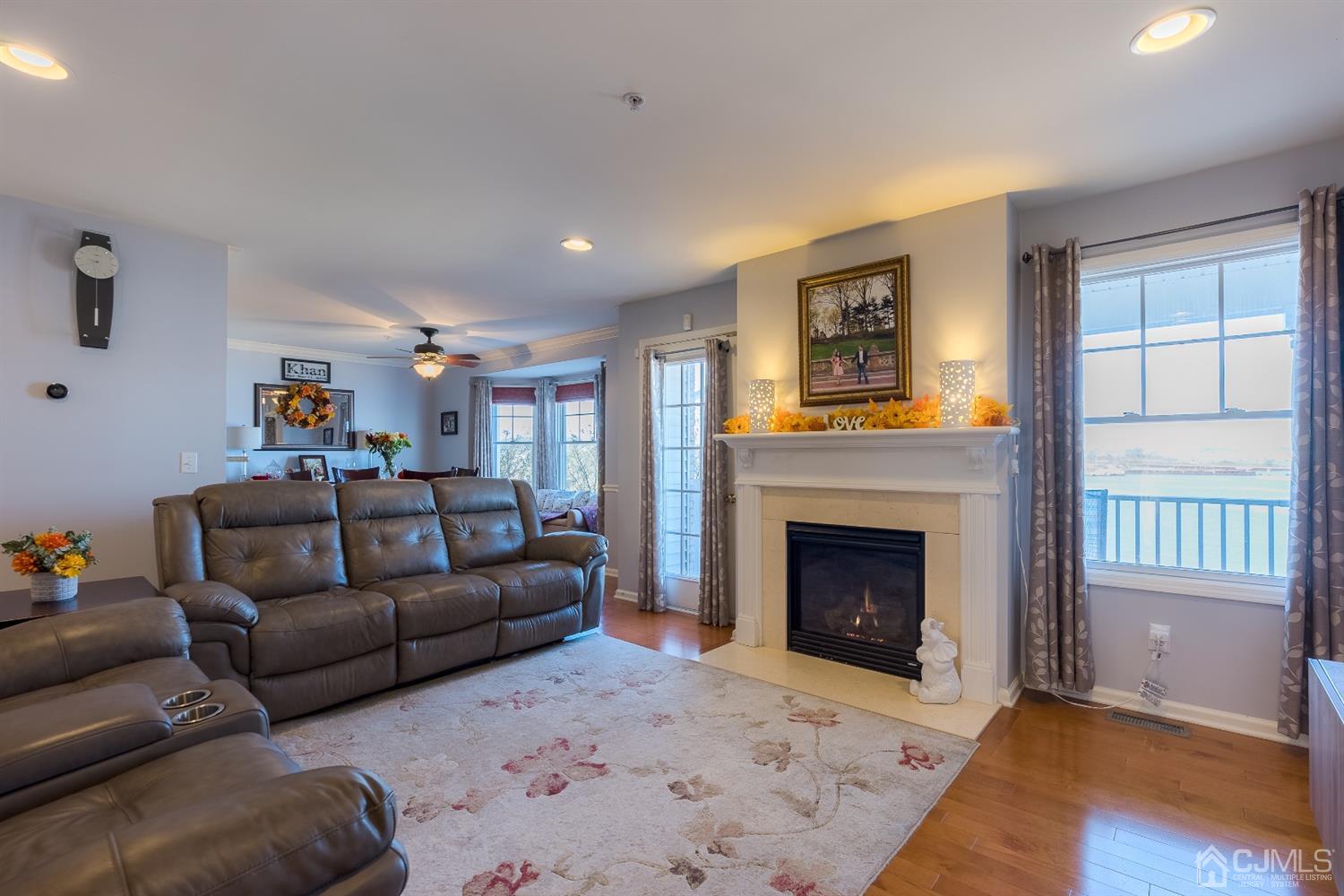 48 Raritan Reach Road South Amboy, NJ 08879 - Photo 6 of 23 a living room with furniture window and a fireplace