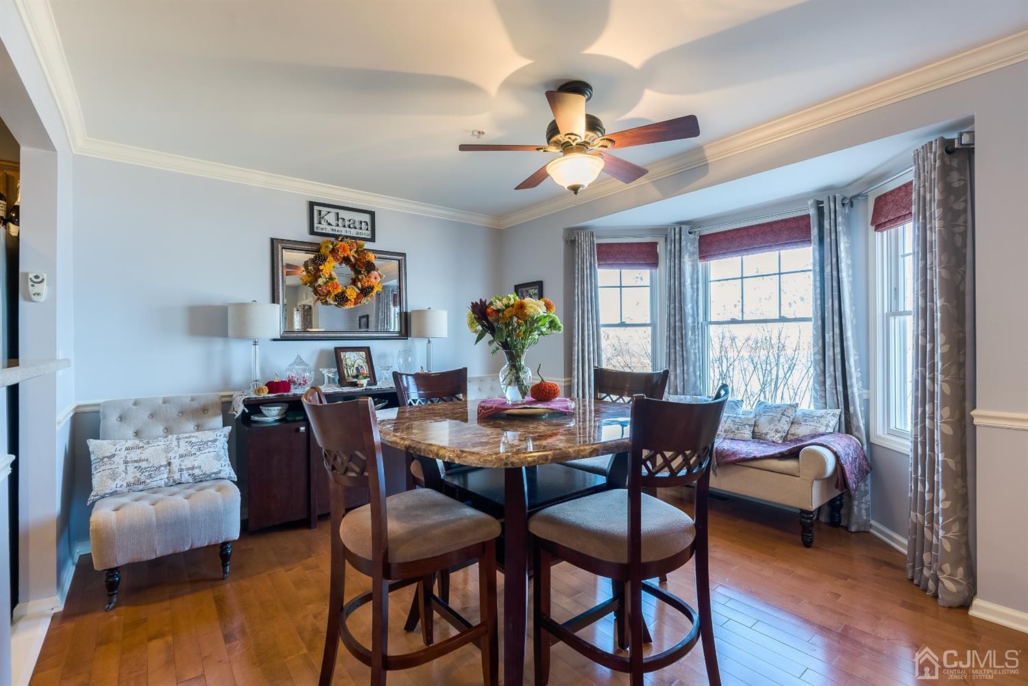48 Raritan Reach Road South Amboy, NJ 08879 - Photo 8 of 23 a view of a dining room with furniture a chandelier and wooden floor