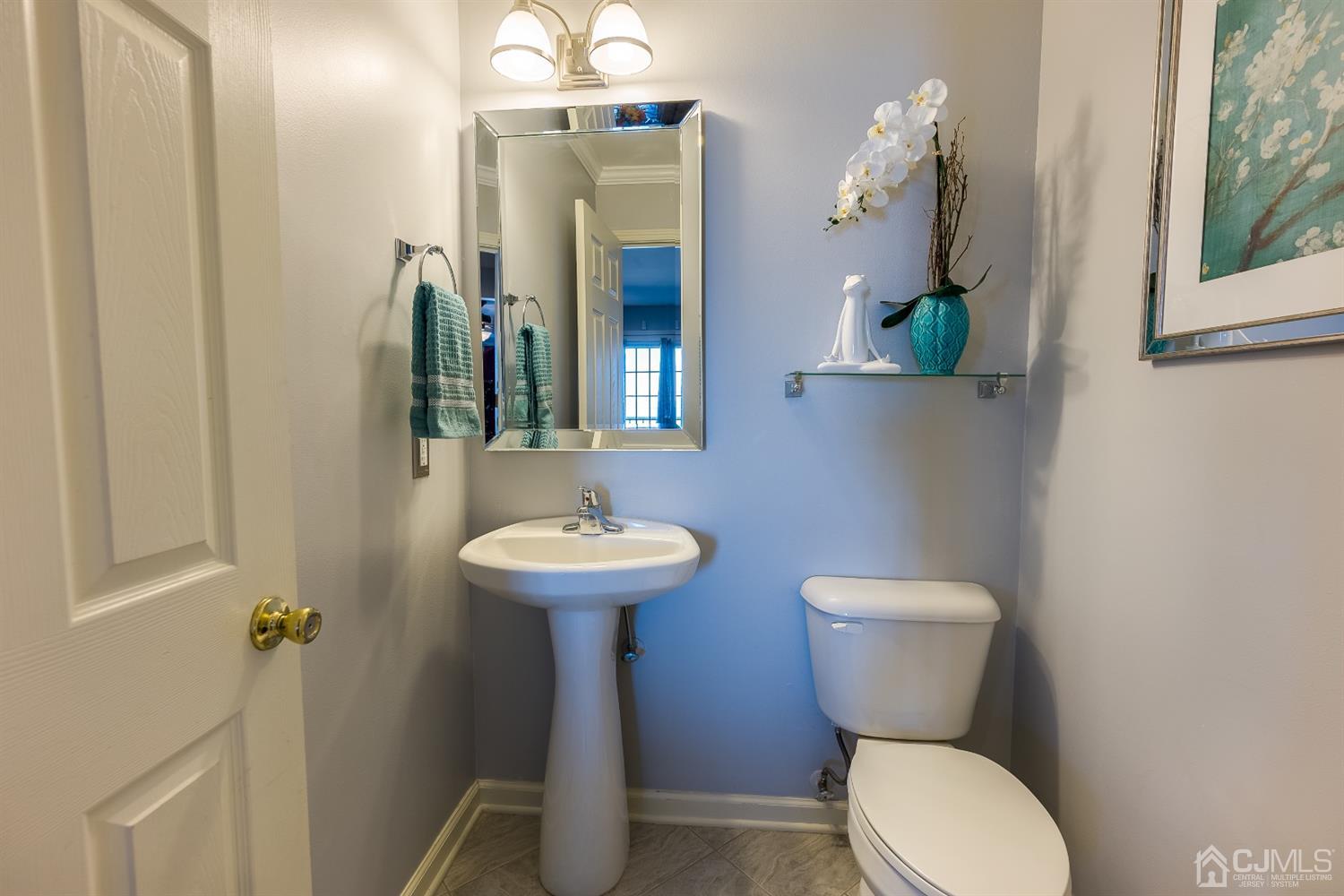 48 Raritan Reach Road South Amboy, NJ 08879 - Photo 9 of 23 a bathroom with a toilet sink and mirror