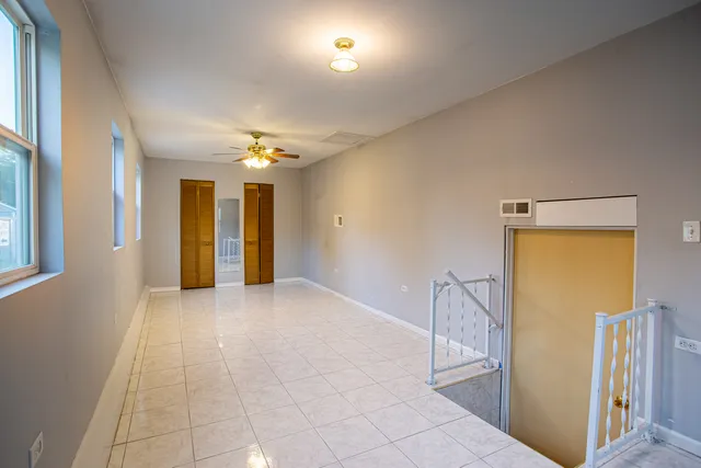 a view of a hallway with front door
