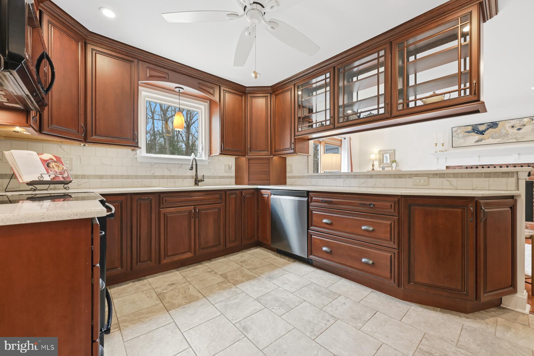 8329 Sail Court Pasadena, MD 21122 - Photo 13 of 61 a kitchen with a stove a sink and a refrigerator