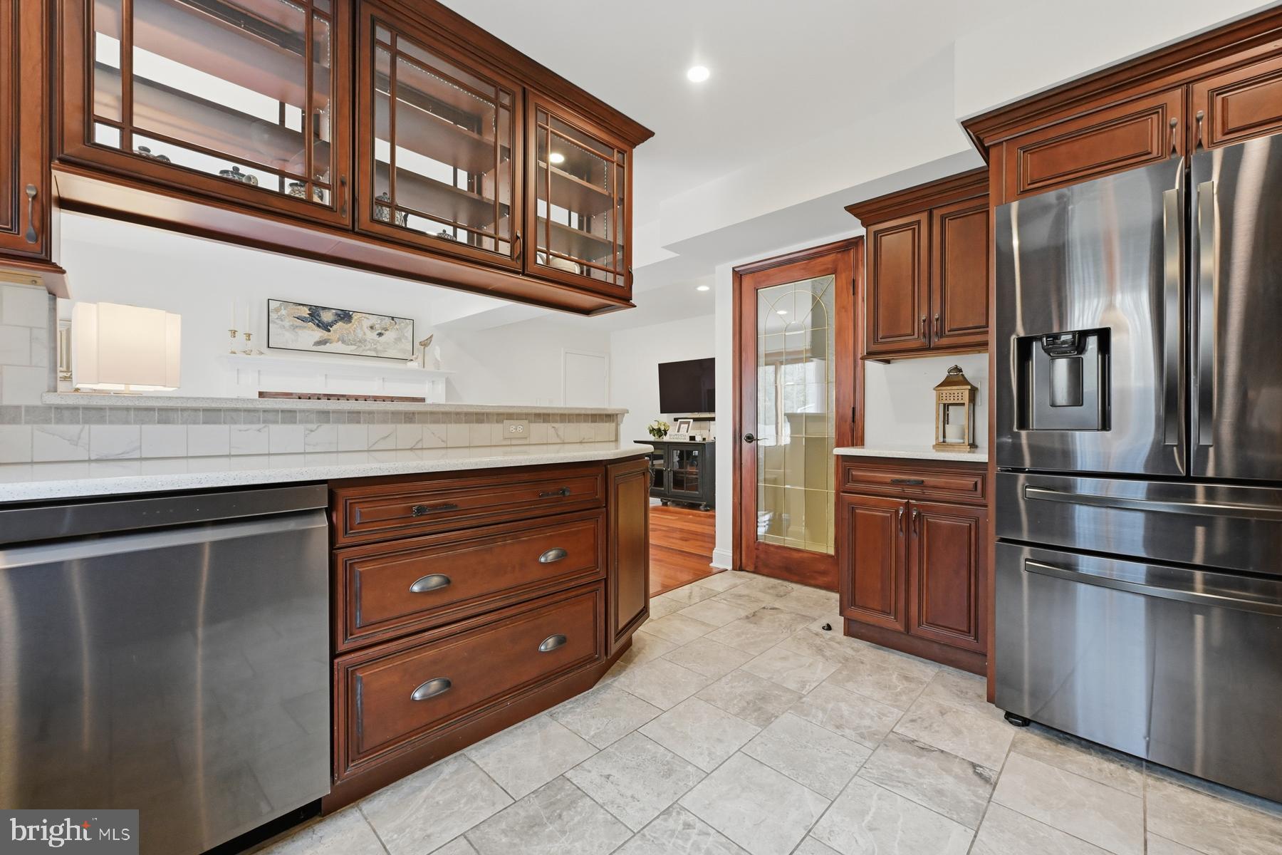 8329 Sail Court Pasadena, MD 21122 - Photo 15 of 61 a kitchen with stainless steel appliances granite countertop a refrigerator and a stove top oven