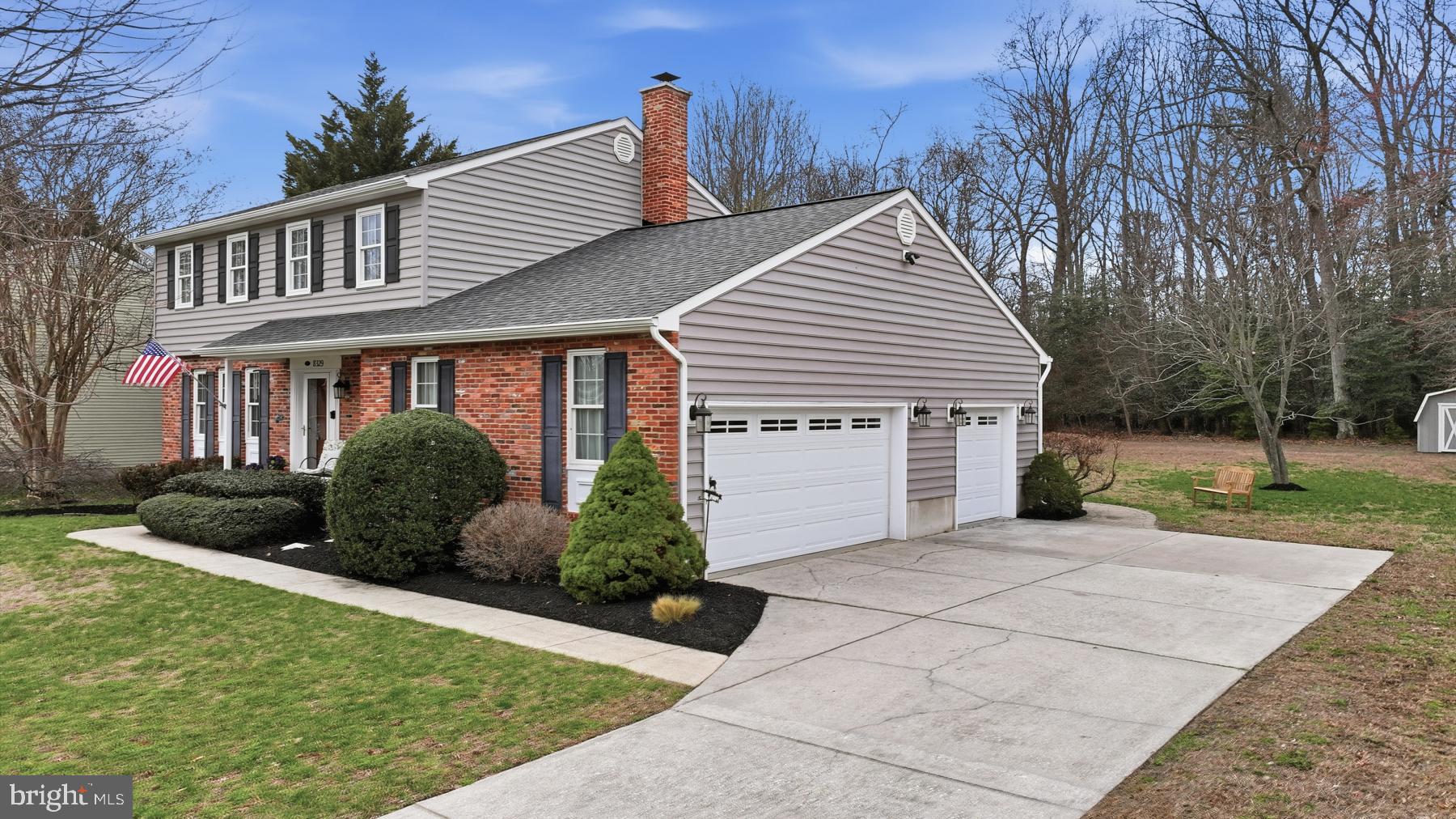 8329 Sail Court Pasadena, MD 21122 - Photo 2 of 61 front view of a house with a yard