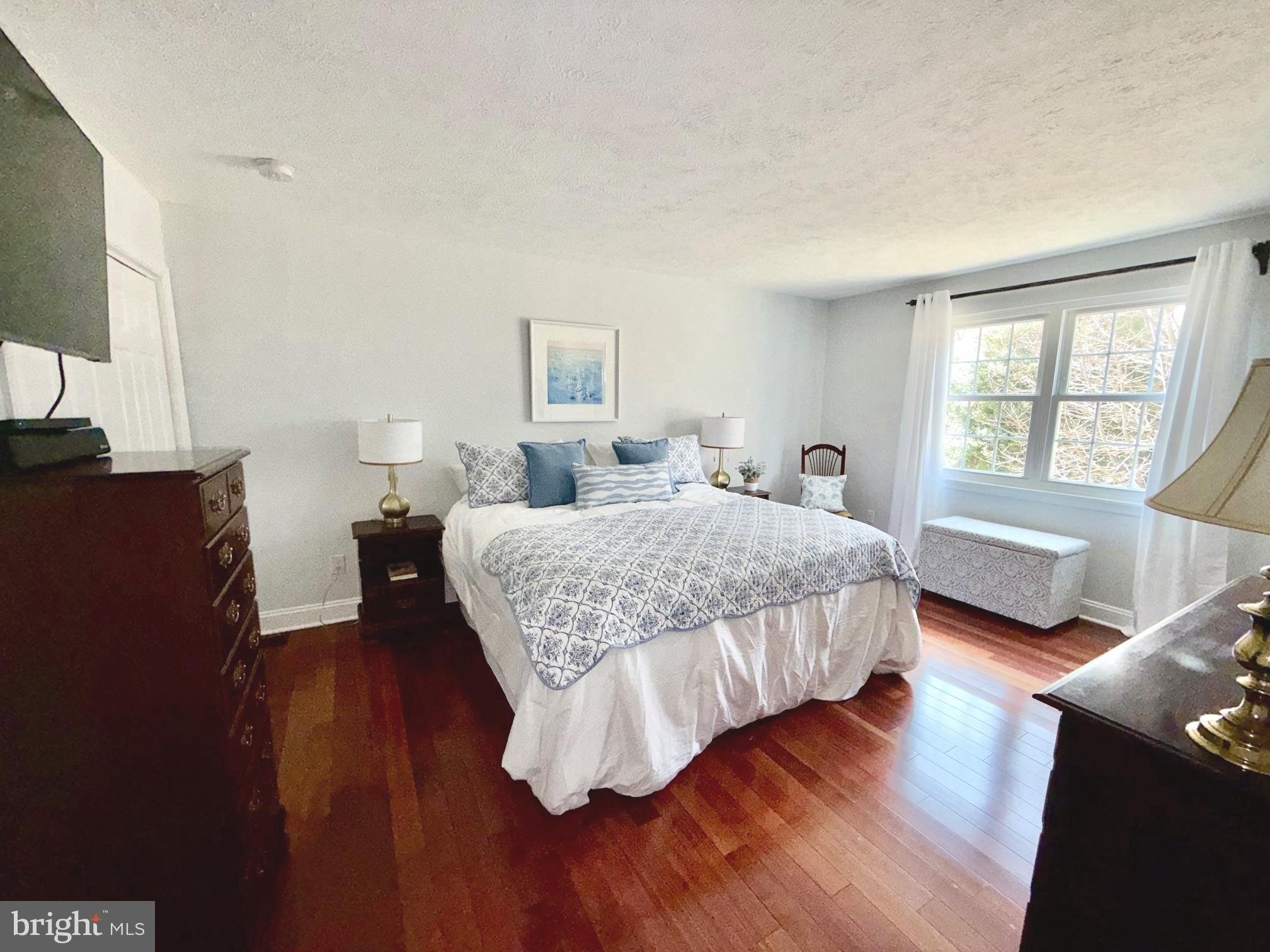 8329 Sail Court Pasadena, MD 21122 - Photo 22 of 61 a bedroom with a bed and a couch