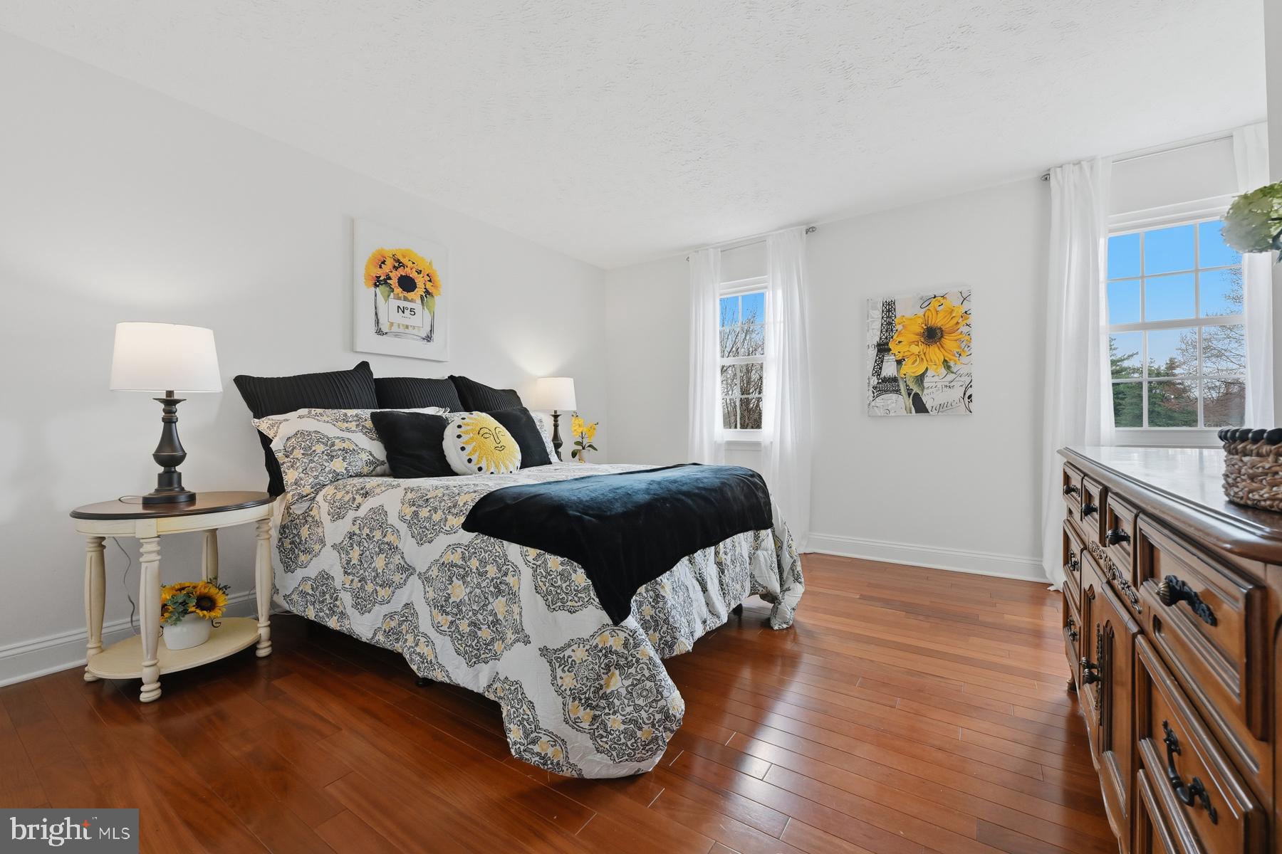 8329 Sail Court Pasadena, MD 21122 - Photo 27 of 61 a bedroom with a bed and wooden floor