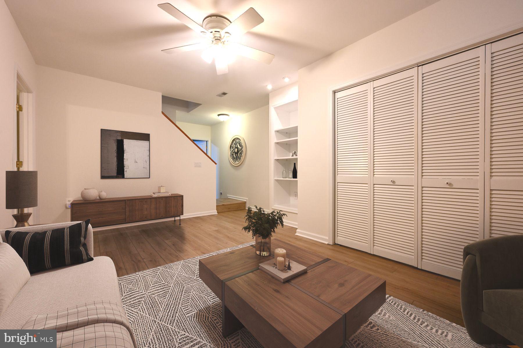 8329 Sail Court Pasadena, MD 21122 - Photo 39 of 61 a living room with furniture and wooden floor
