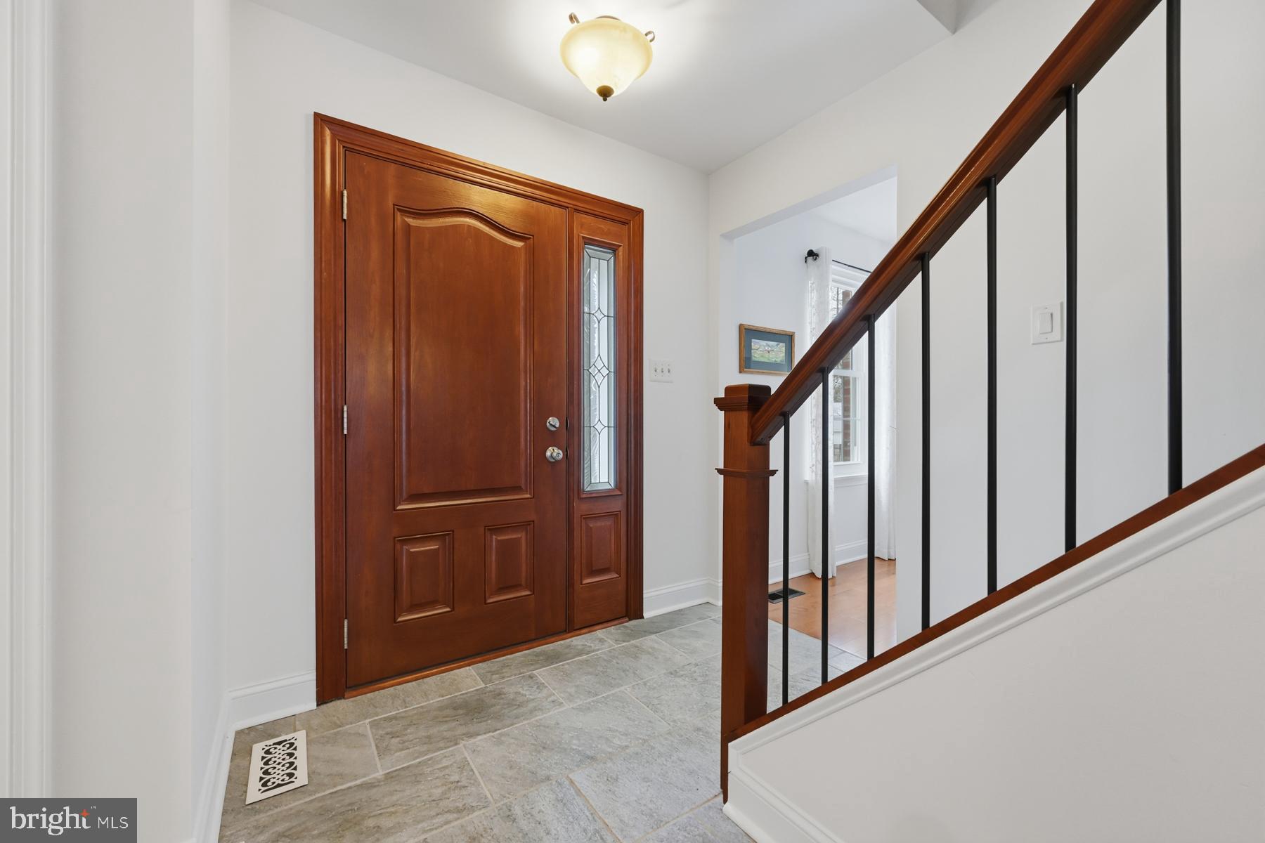 8329 Sail Court Pasadena, MD 21122 - Photo 4 of 61 a view of an entryway with wooden floor