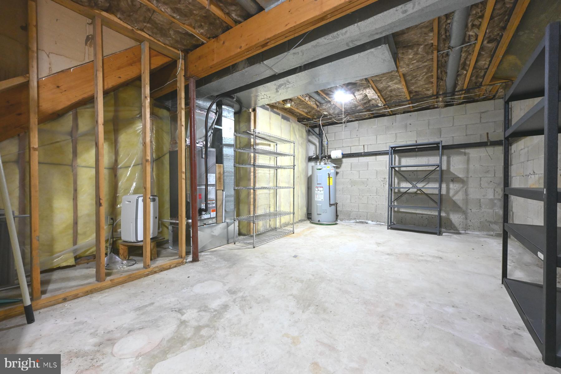 8329 Sail Court Pasadena, MD 21122 - Photo 43 of 61 Unfinished Storage Area