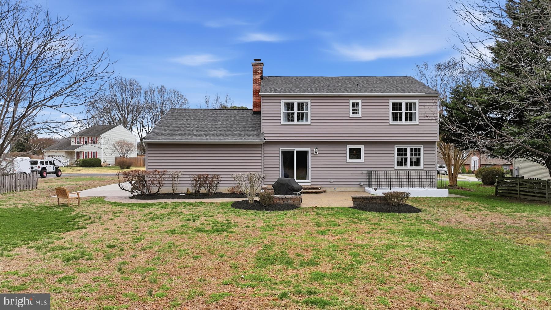 8329 Sail Court Pasadena, MD 21122 - Photo 45 of 61 a front view of a house with a yard