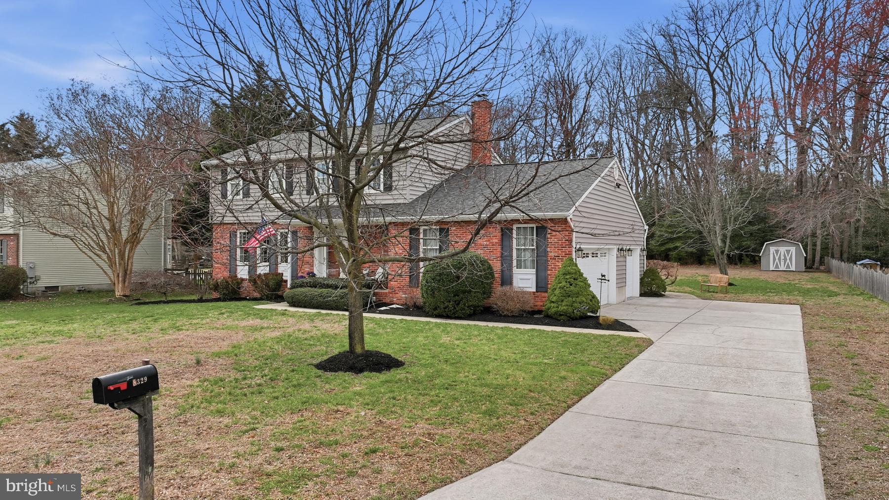 8329 Sail Court Pasadena, MD 21122 - Photo 46 of 61 a front view of a house with a yard