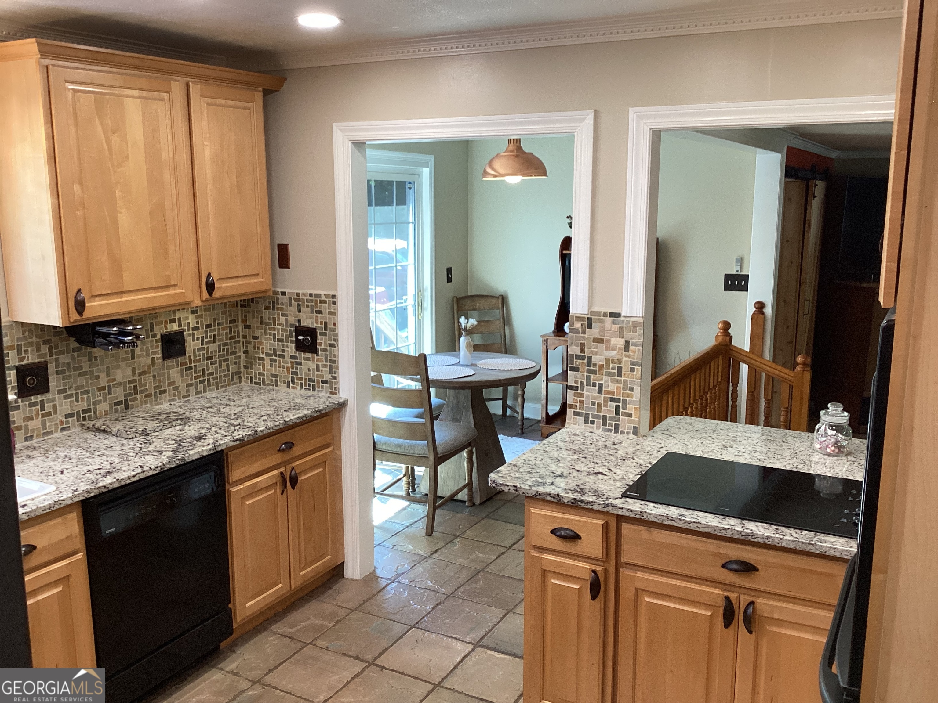 2779 Bob Cox Road Marietta, GA 30064 - Photo 15 of 48 a kitchen with a sink stove and cabinets