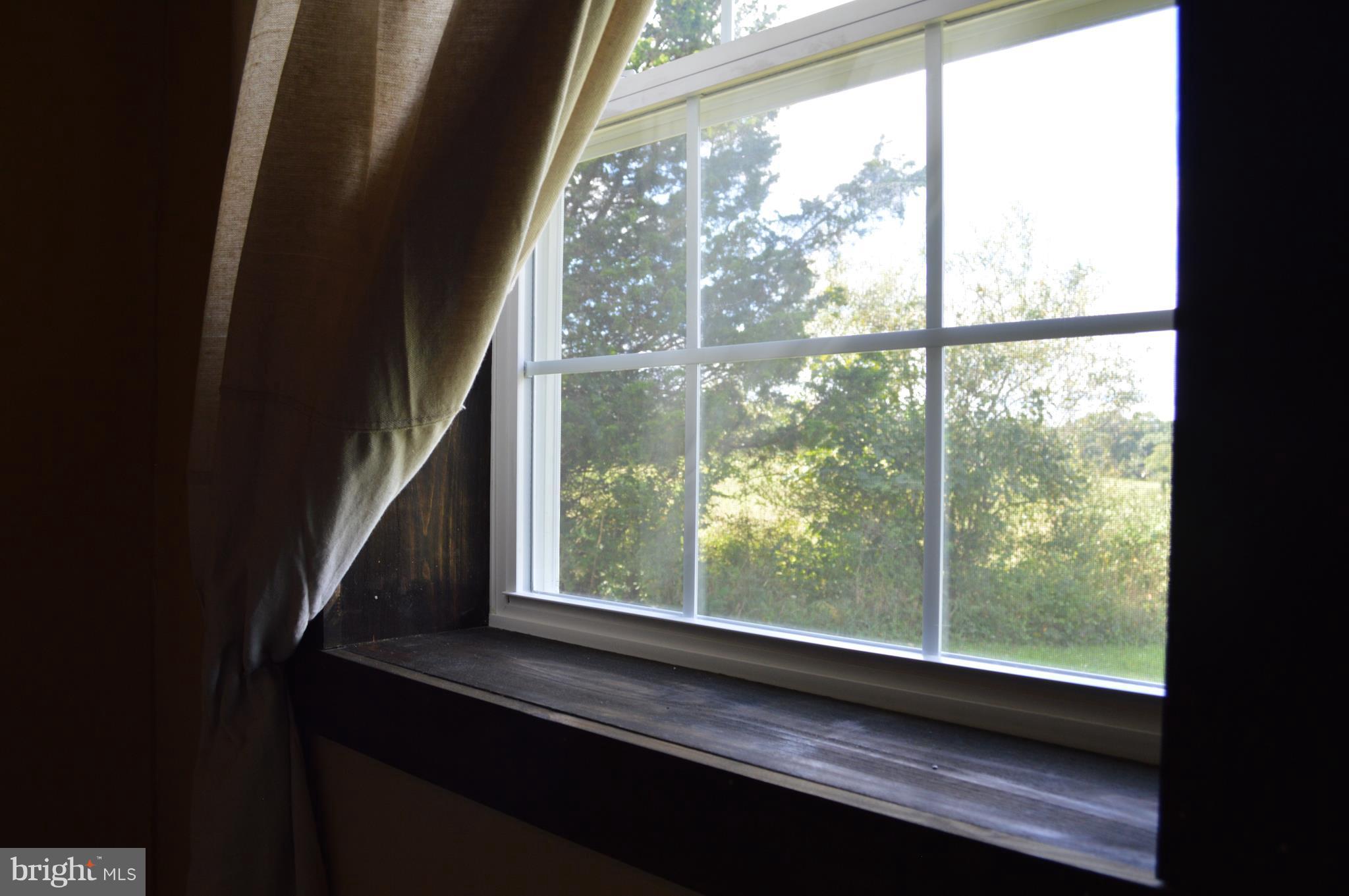 926 County Rte 1/1 Berkeley Springs, WV 25411 - Photo 17 of 26 Deep window wells equals lots of insulation