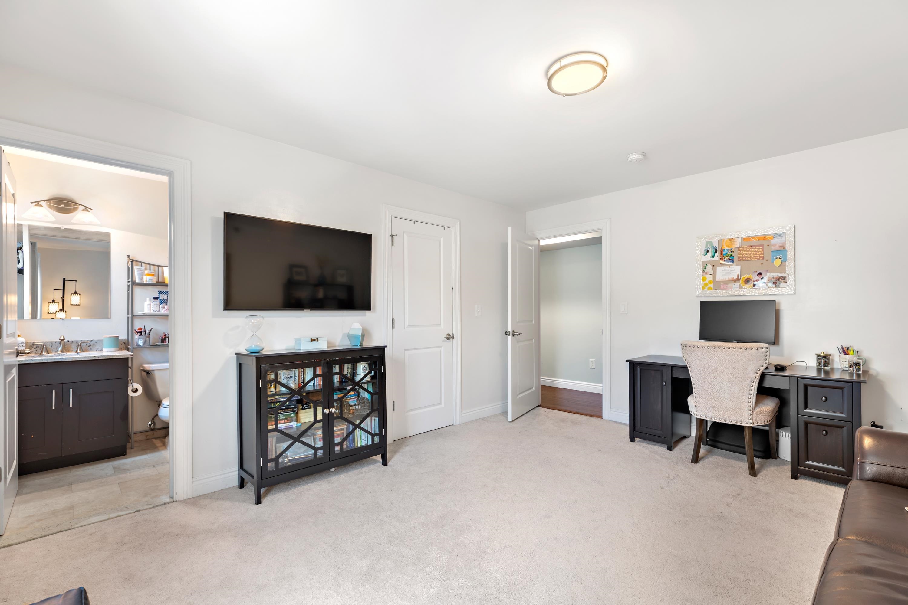 137 20th Street, Unit B Union City, NJ 07087 - Photo 16 of 33 a living room with furniture and a flat screen tv