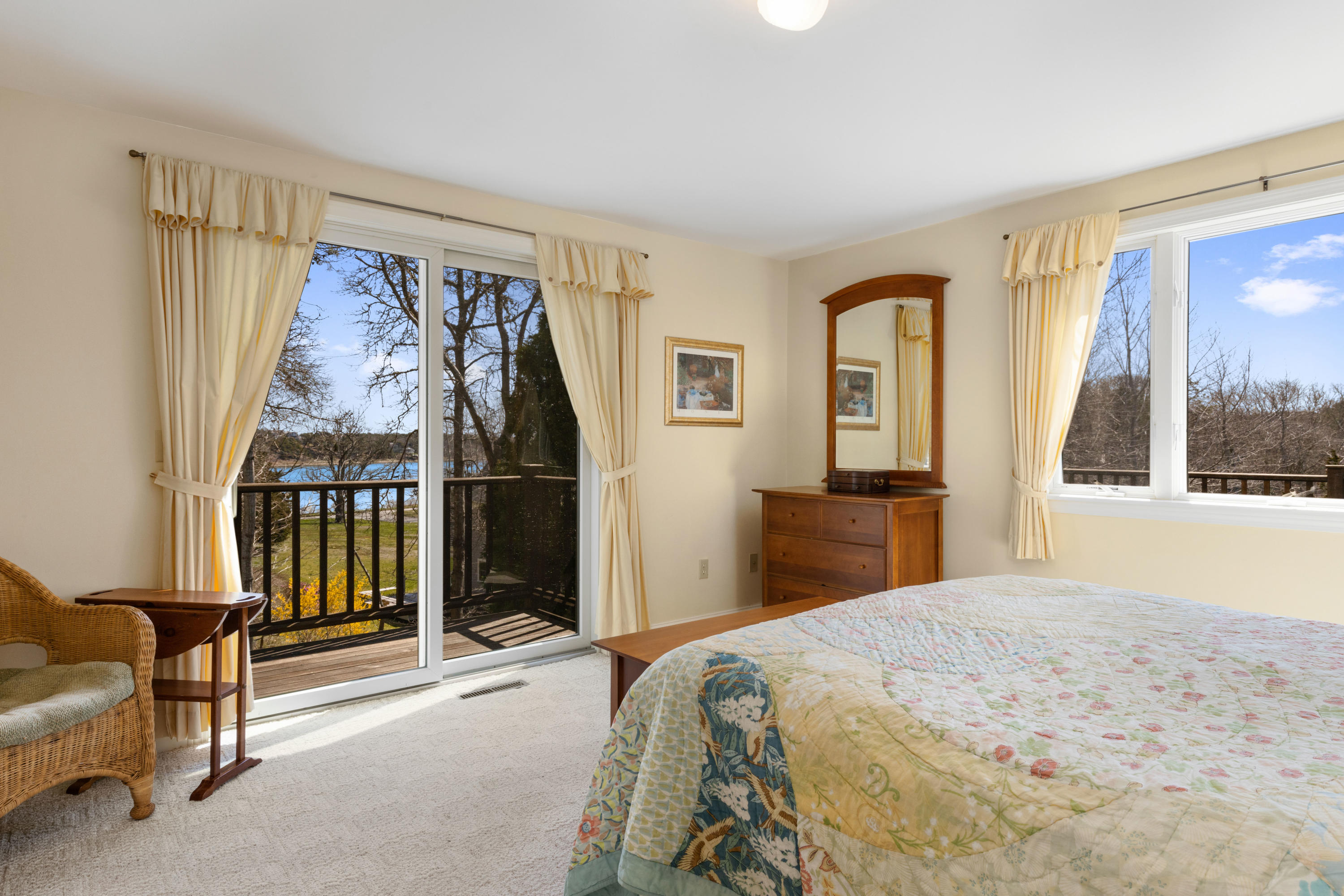 38 Crosswind Farm Road Chatham, MA 02633 - Photo 11 of 36 a bedroom with a bed and a large window
