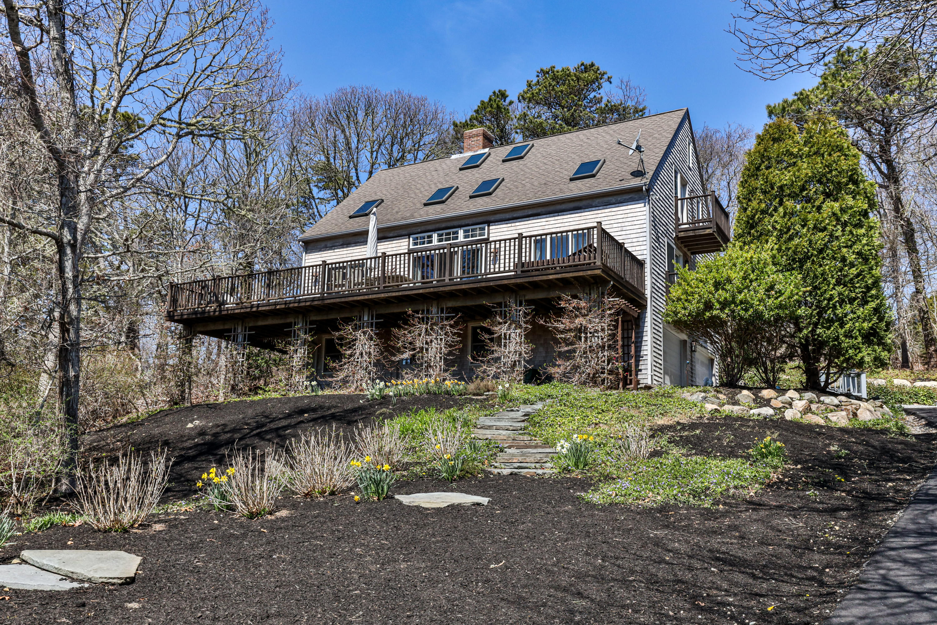 38 Crosswind Farm Road Chatham, MA 02633 - Photo 25 of 36 a terrace of a house with outdoor seating