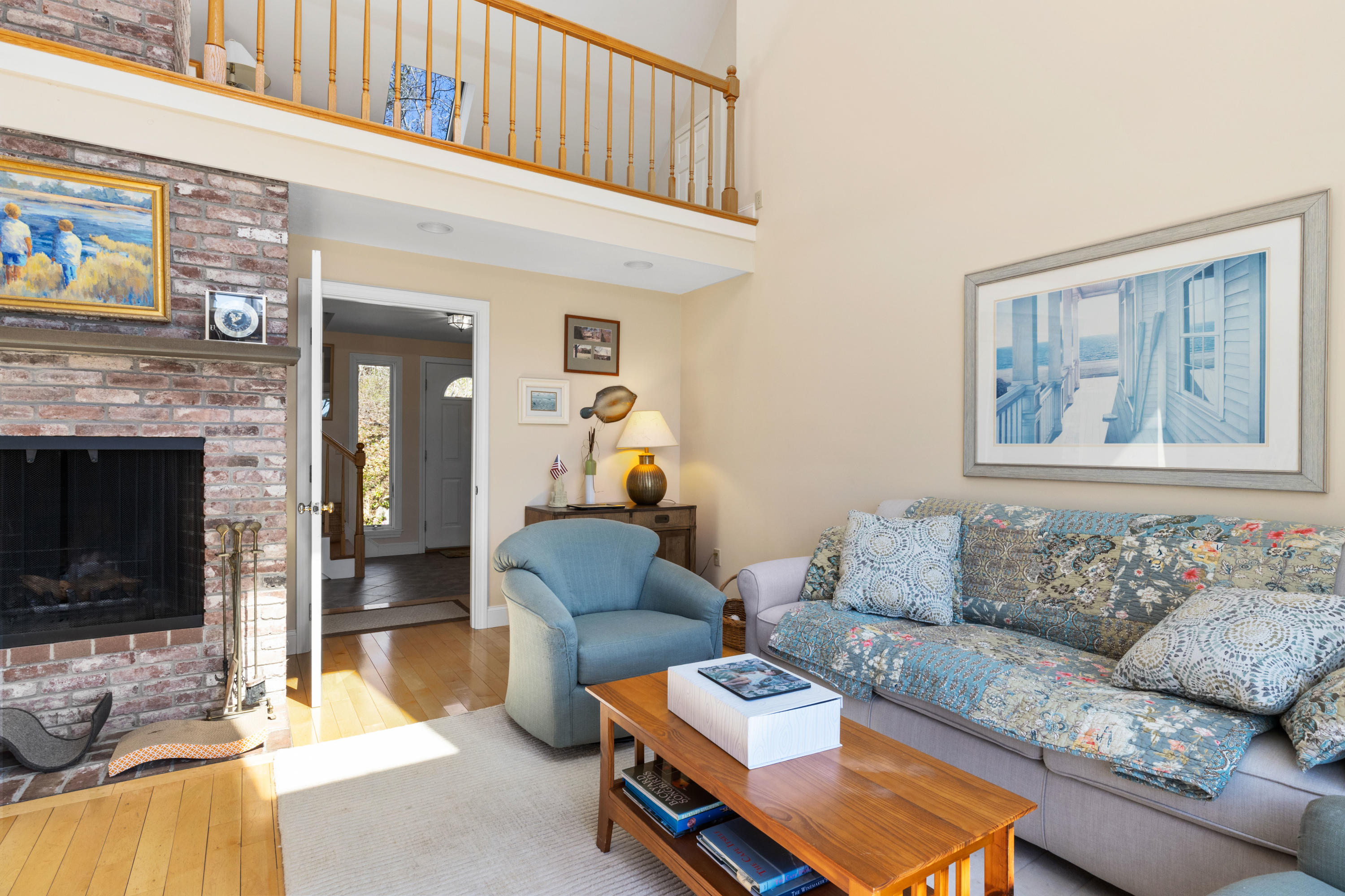 38 Crosswind Farm Road Chatham, MA 02633 - Photo 5 of 36 a living room with furniture and a fireplace
