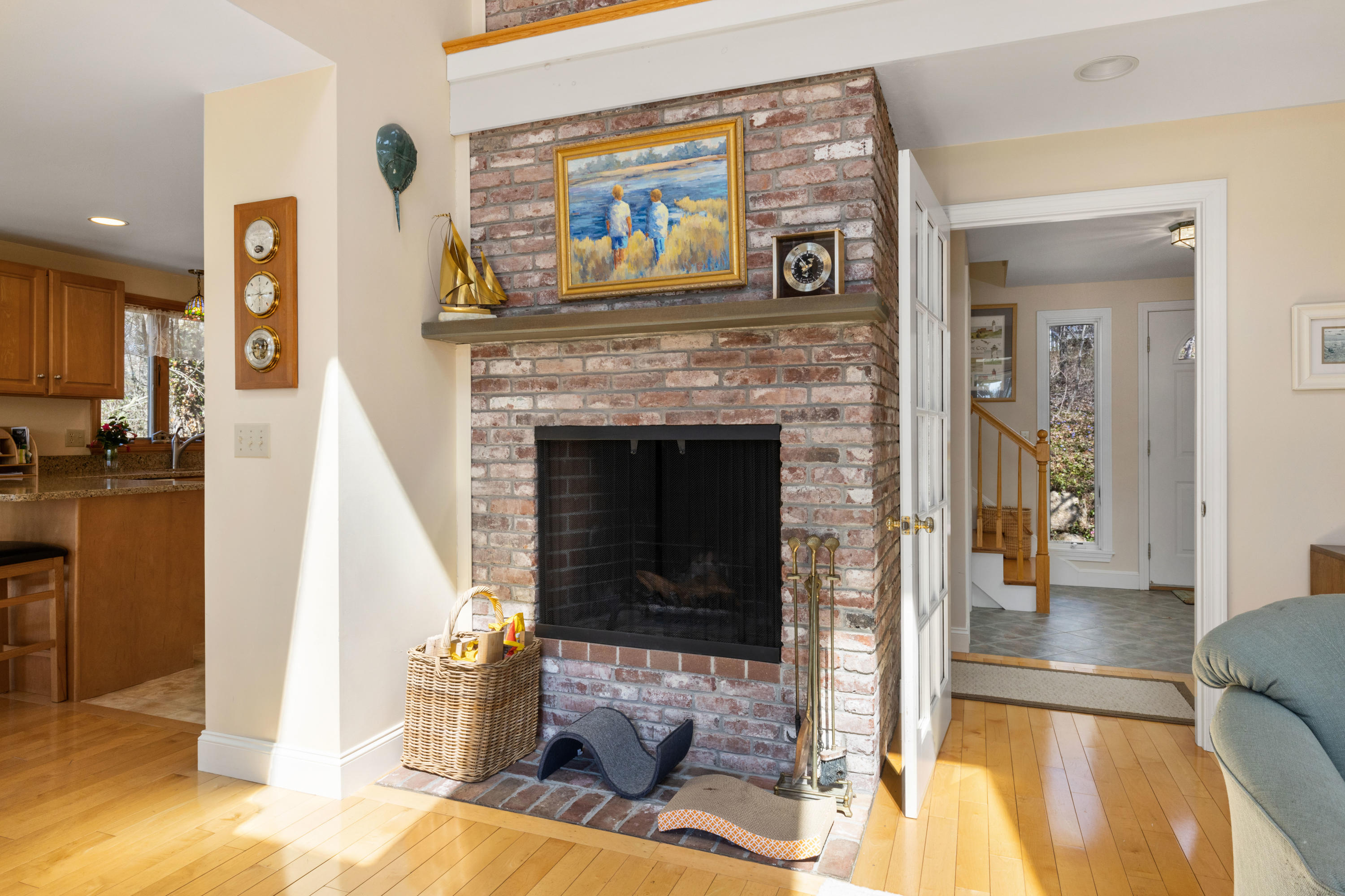 38 Crosswind Farm Road Chatham, MA 02633 - Photo 6 of 36 a living room with furniture and a fireplace