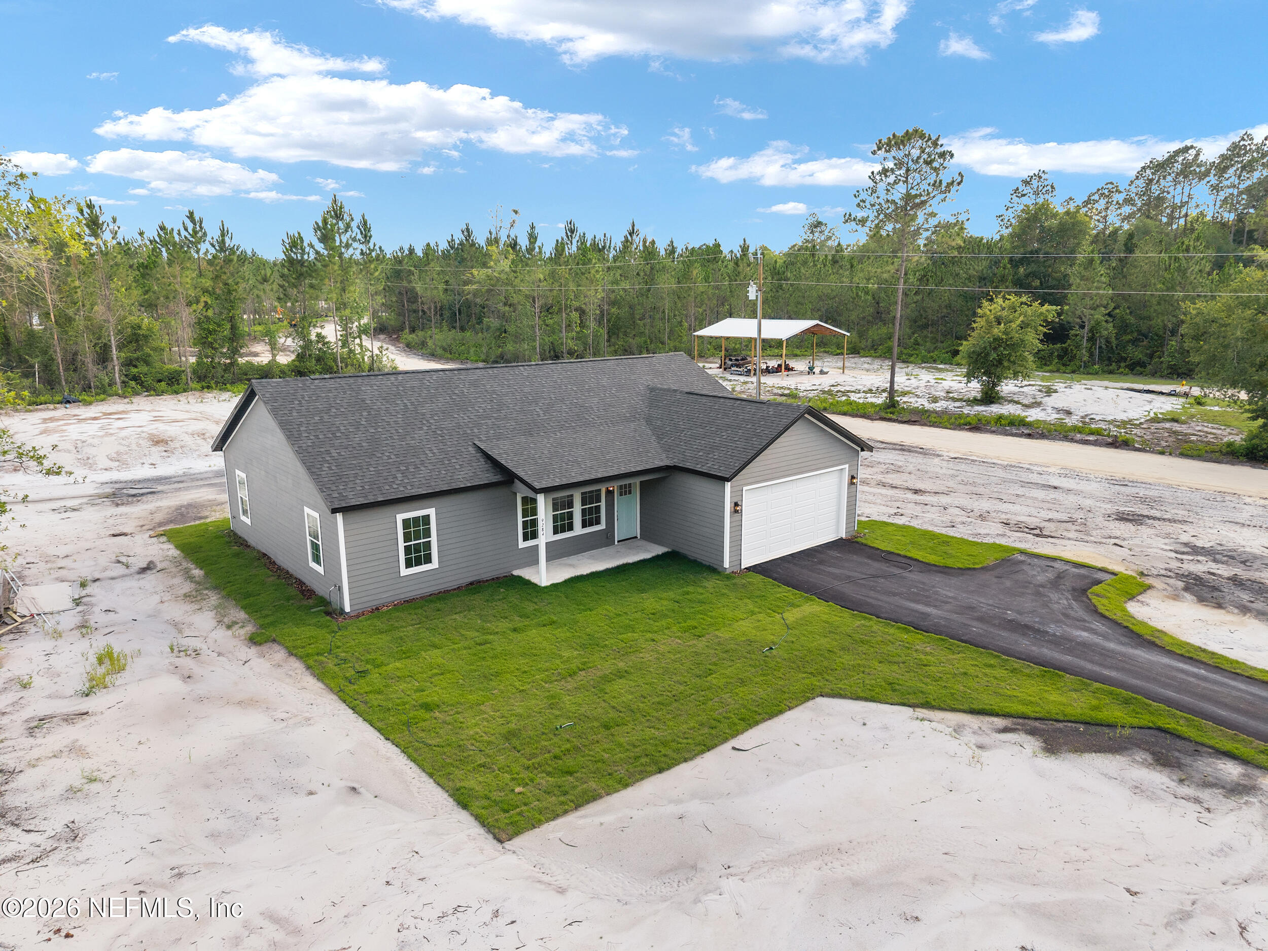 9284 Southwest Sw Cr Hampton, FL 32044 - Photo 39 of 48 DJI_20260625184323_0345_D