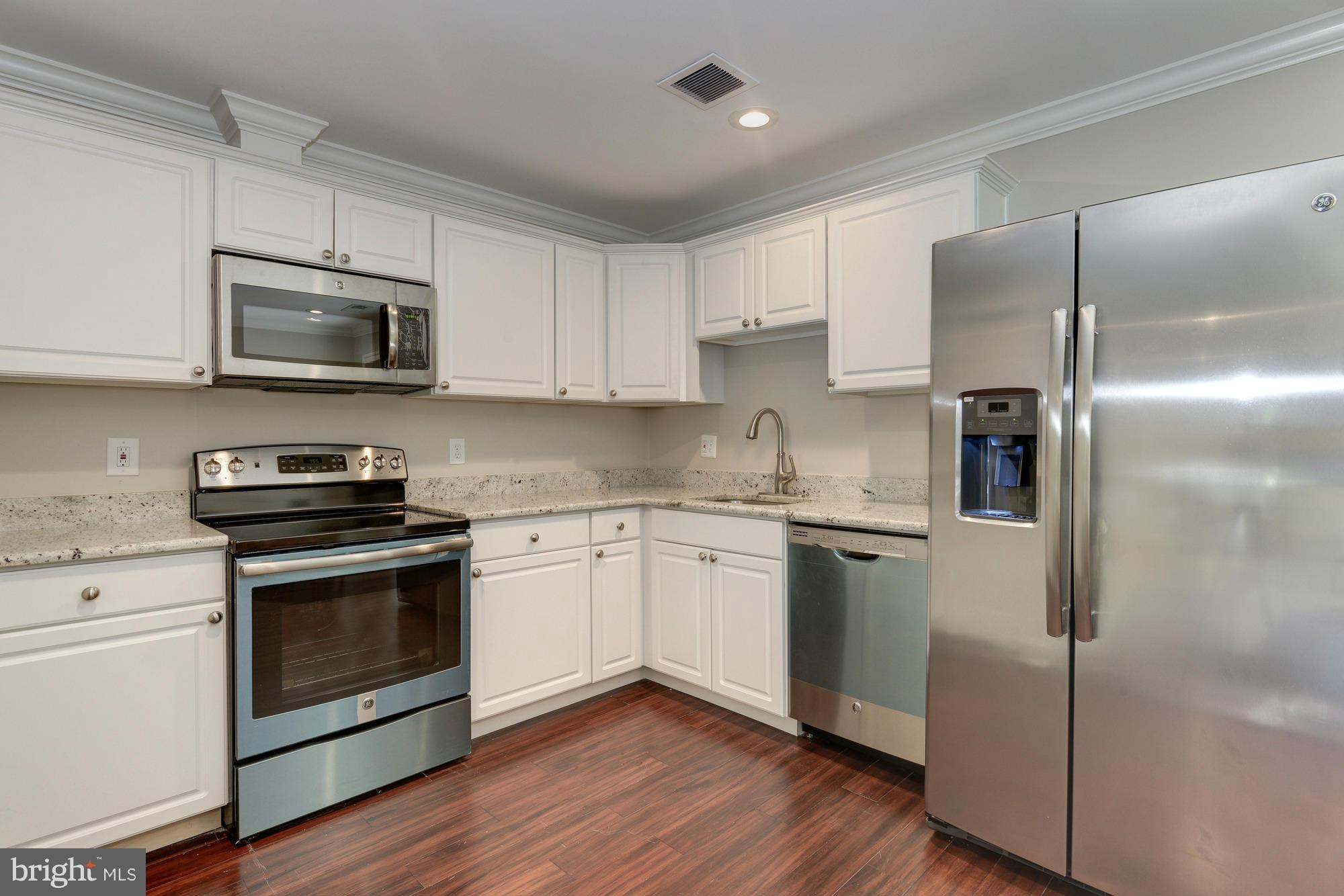 2237 Cartwright Place Reston, VA 20191 - Photo 6 of 25 All new stainless steel GE appliances and granite