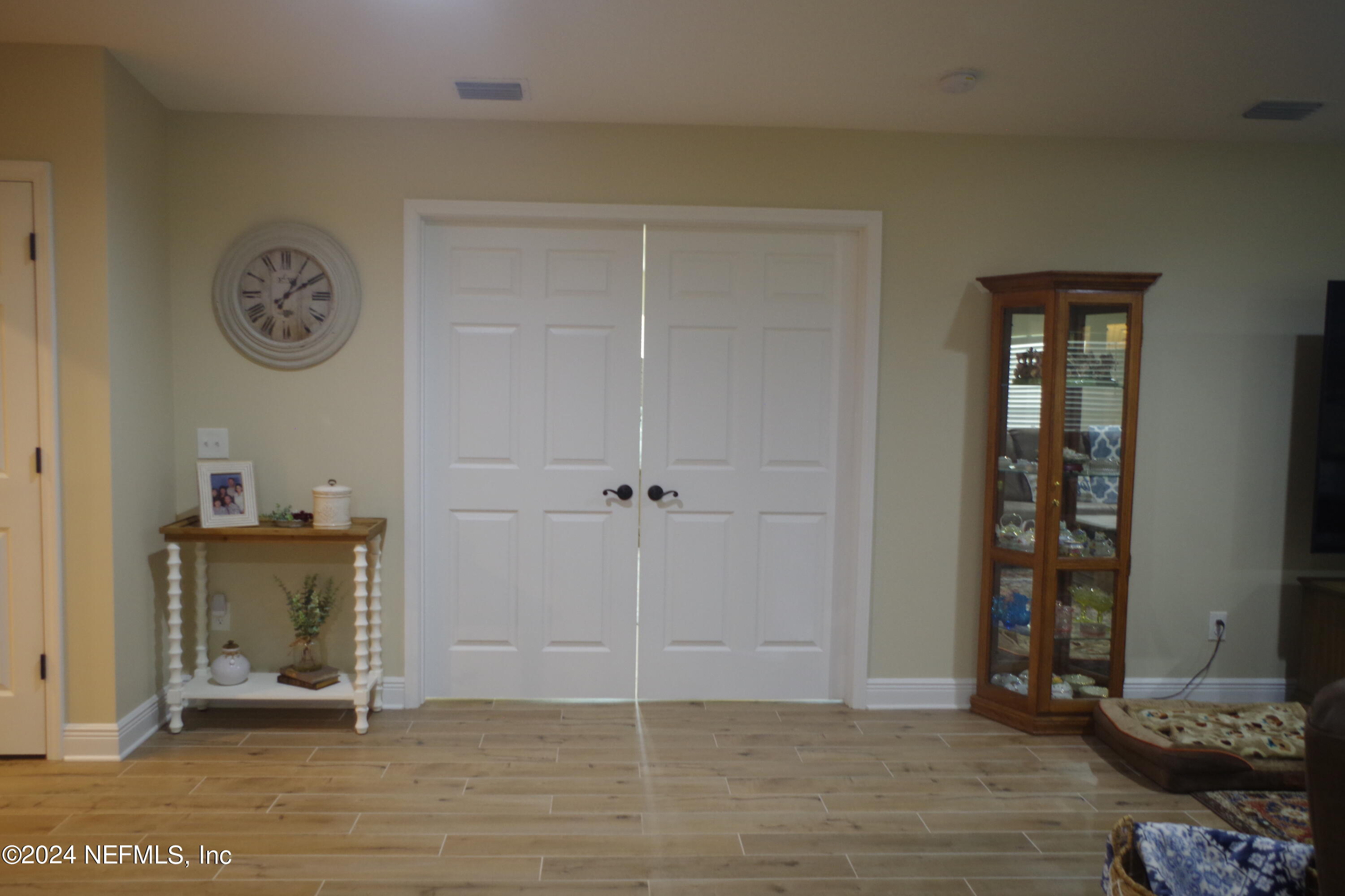54065 Howard Road Callahan, FL 32011 - Photo 21 of 69 a view of a room with wooden floor and closet