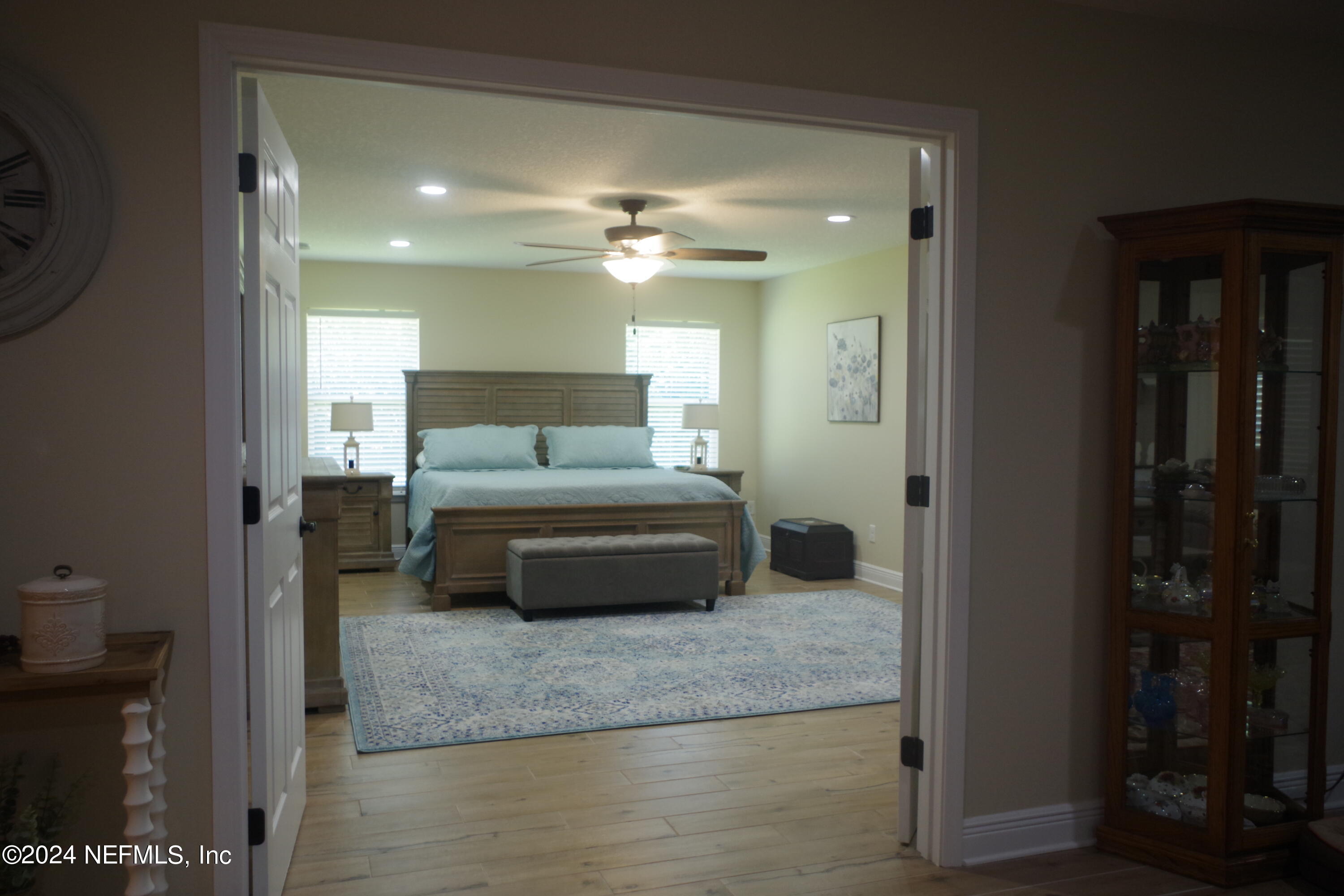 54065 Howard Road Callahan, FL 32011 - Photo 22 of 69 a living room with furniture and a chandelier