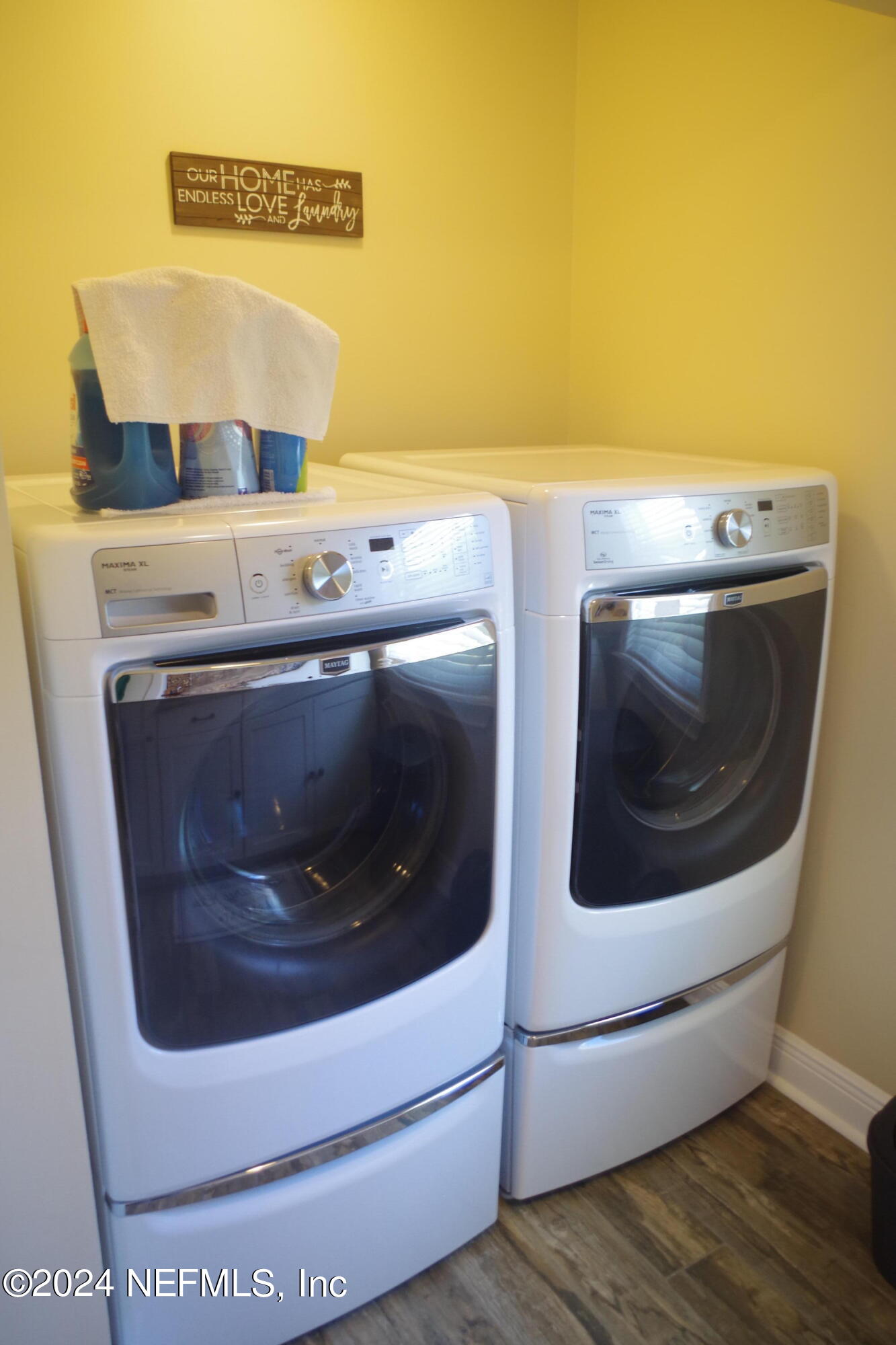 54065 Howard Road Callahan, FL 32011 - Photo 48 of 69 a utility room with washing machine and wooden floor