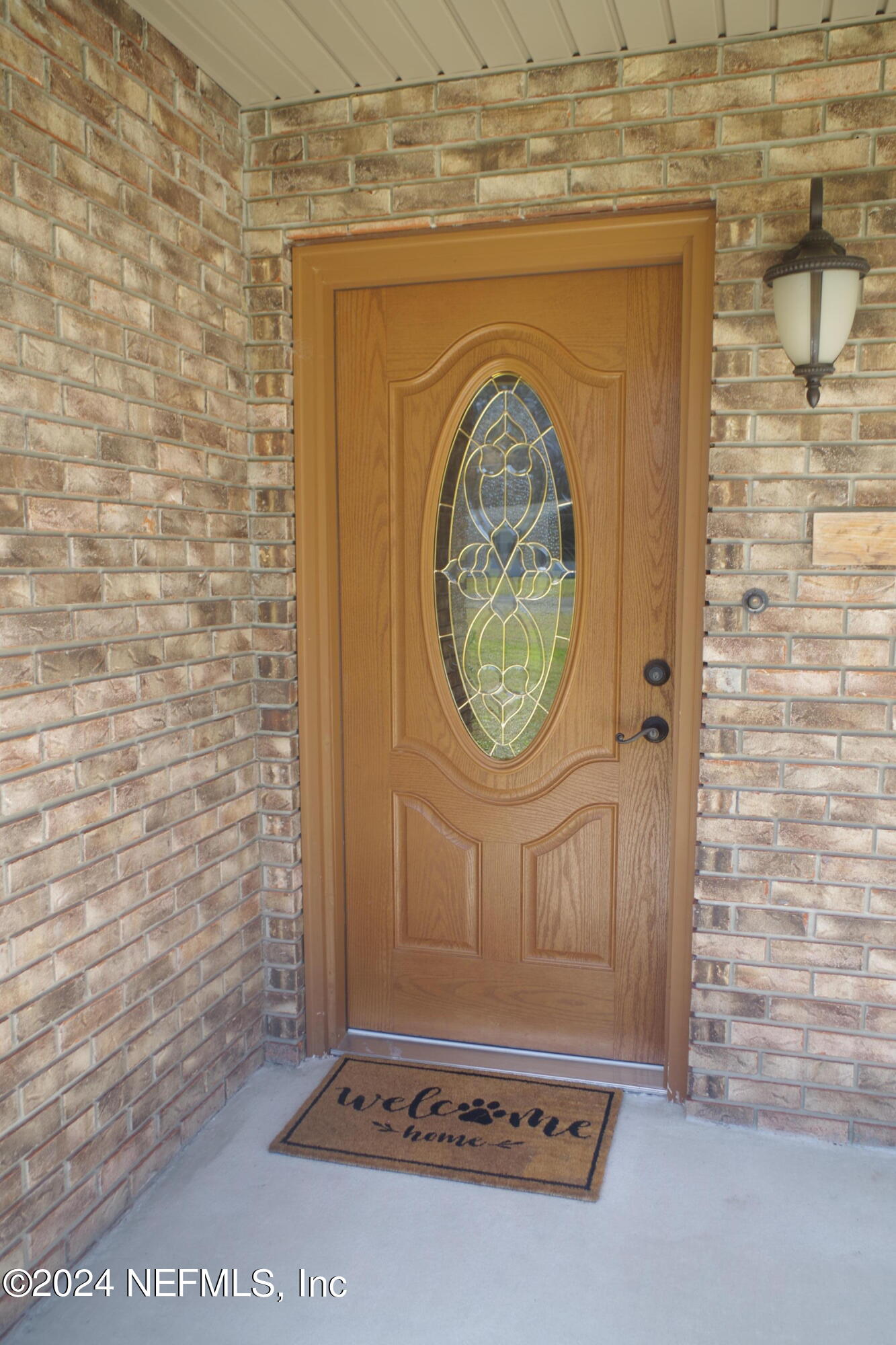 54065 Howard Road Callahan, FL 32011 - Photo 5 of 69 a picture of a door of a house