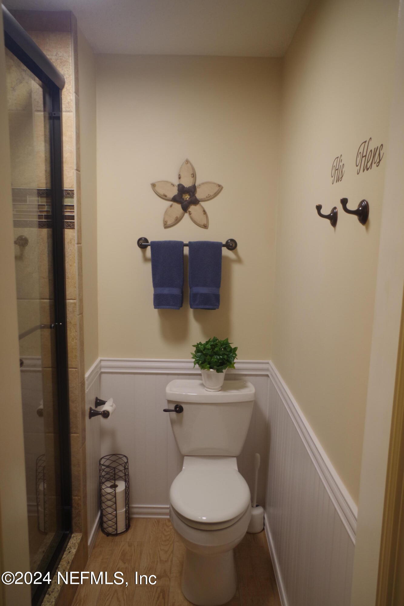 54065 Howard Road Callahan, FL 32011 - Photo 56 of 69 a bathroom with a toilet and a shower
