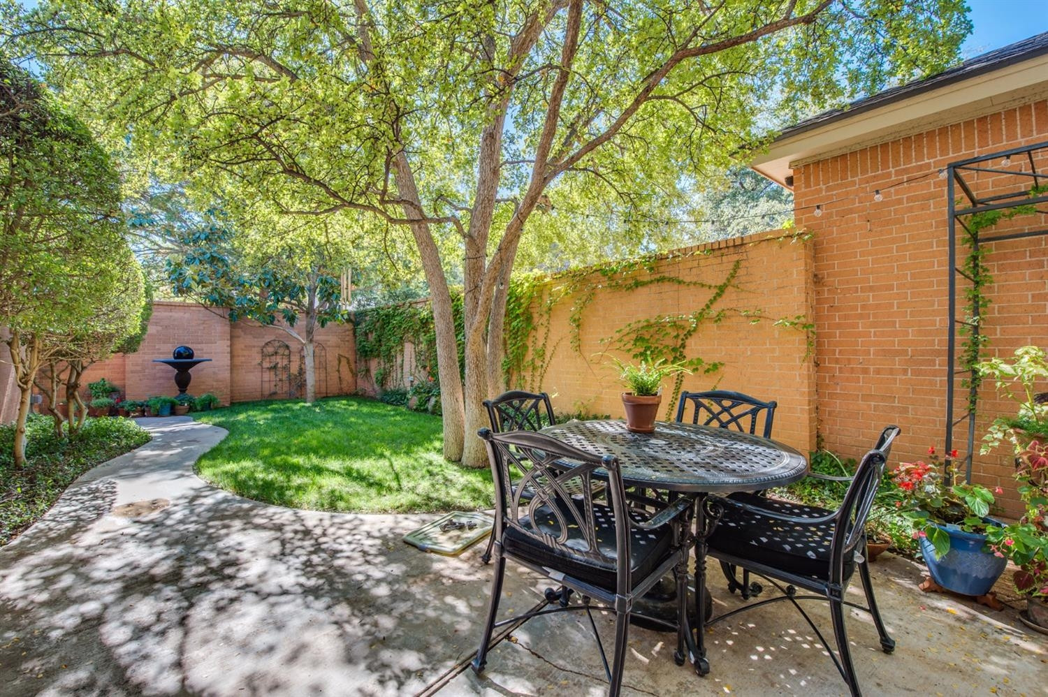 4407 7th Street Lubbock, TX 79416 - Photo 3 of 10 a view of an outdoor sitting area with furniture and garden