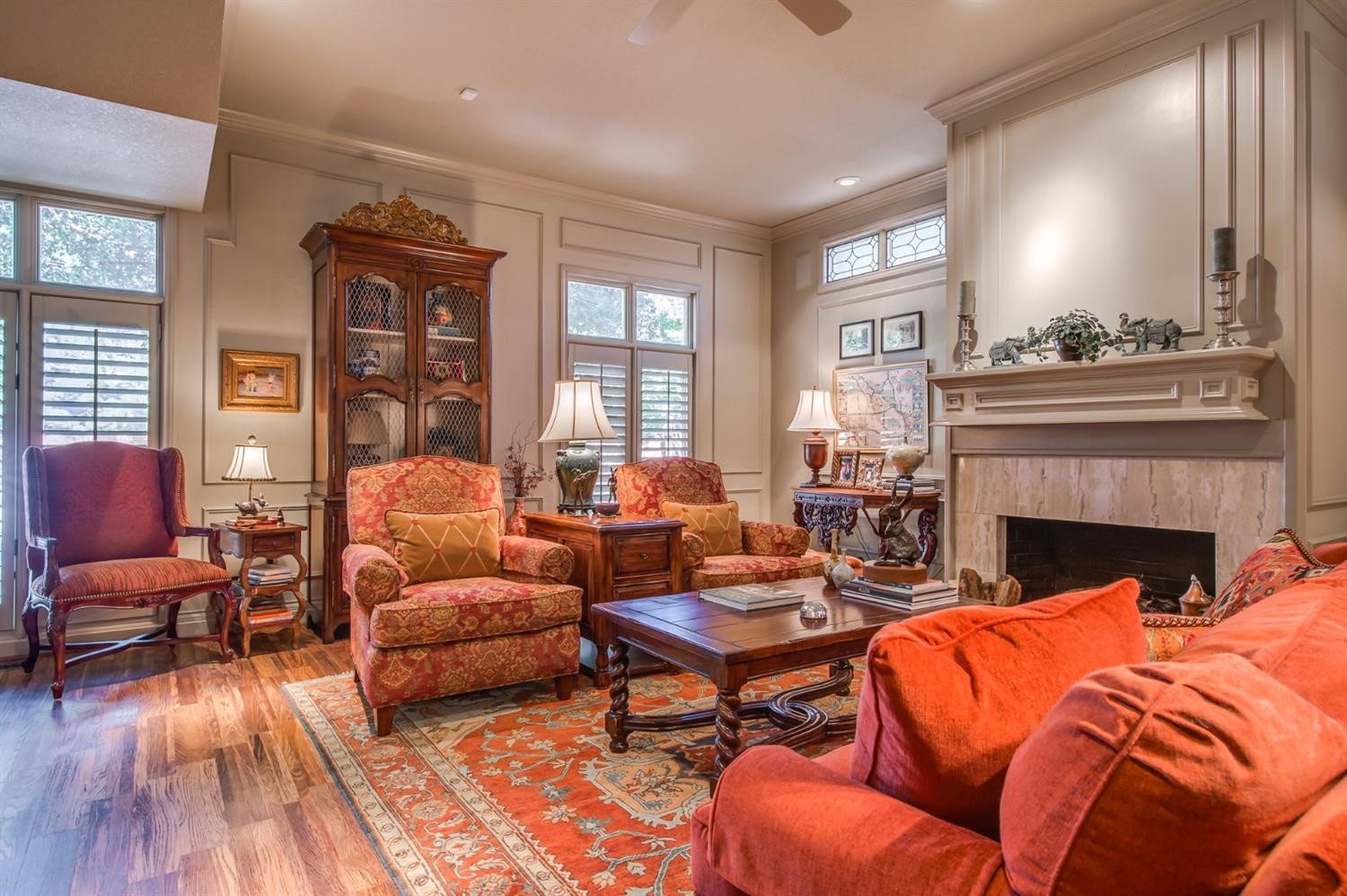 4407 7th Street Lubbock, TX 79416 - Photo 7 of 10 a living room with furniture and a fireplace