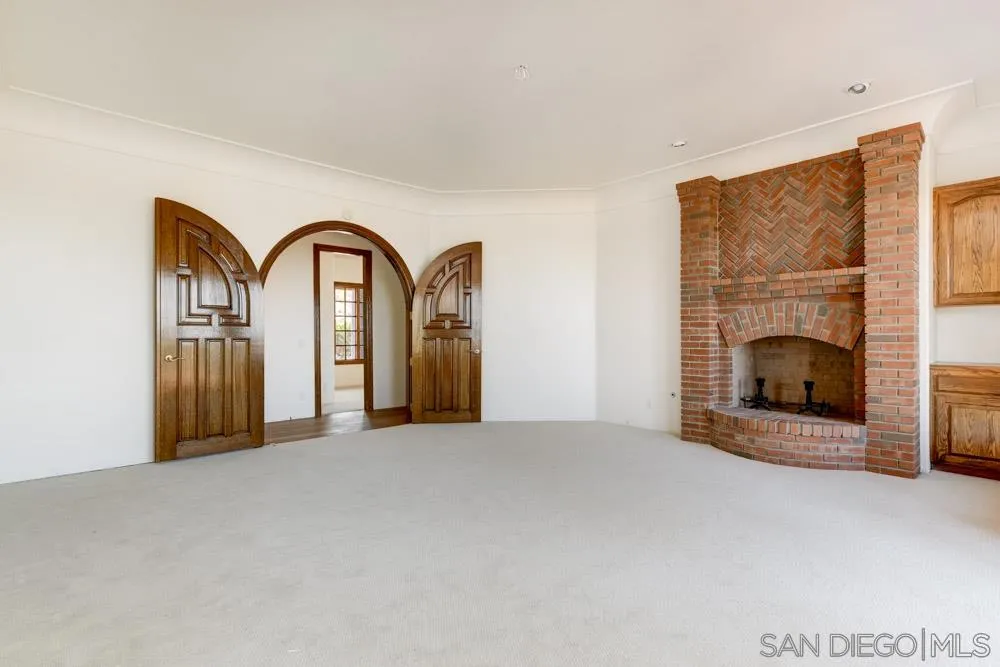1762 Kings Road Vista, CA 92084 - Photo 15 of 24 a view of a livingroom with a fireplace