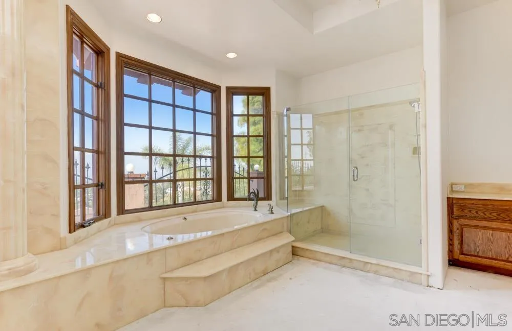1762 Kings Road Vista, CA 92084 - Photo 17 of 24 a spacious bathroom with a bathtub and a shower