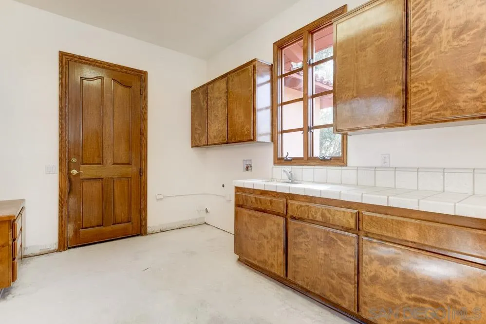 1762 Kings Road Vista, CA 92084 - Photo 22 of 24 a bathroom with a sink and a bathtub