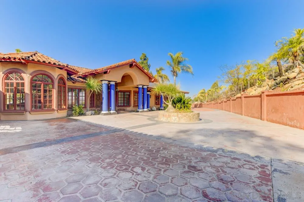 1762 Kings Road Vista, CA 92084 - Photo 3 of 24 a view of a white house with a street