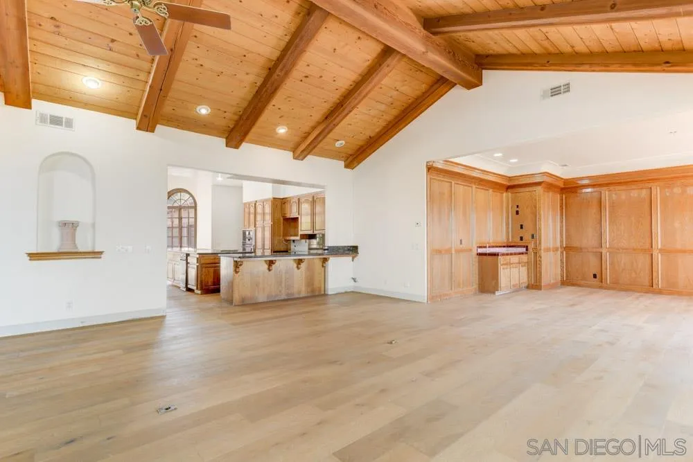 1762 Kings Road Vista, CA 92084 - Photo 9 of 24 a view of empty room with wooden floor